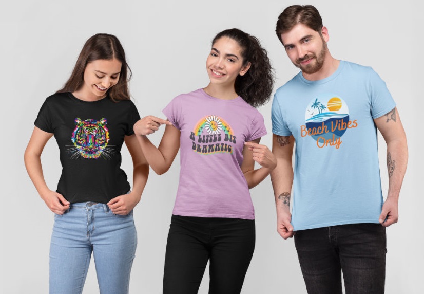 Two women and a man model t-shirts printed with colorful designs